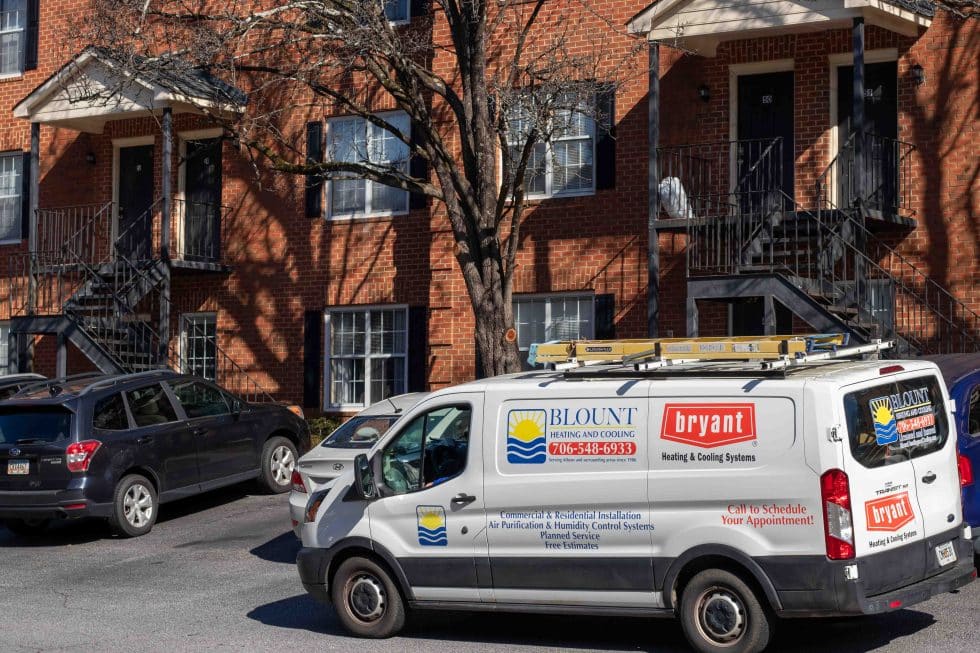 Blount Heating and Cooling service truck parked outside a customer's home